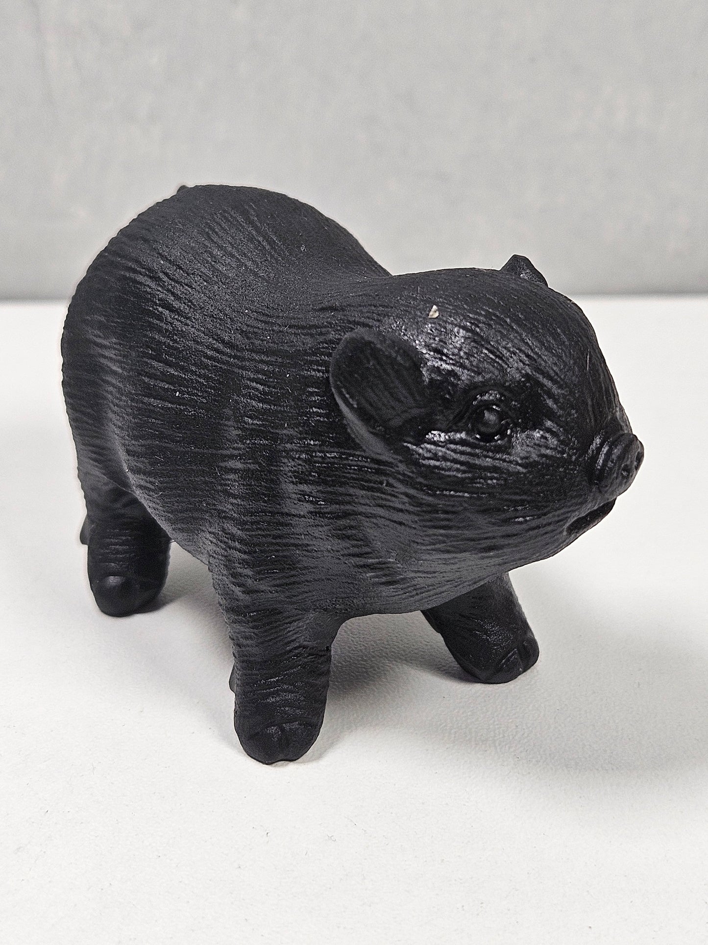 Zwarte obsidiaan varken