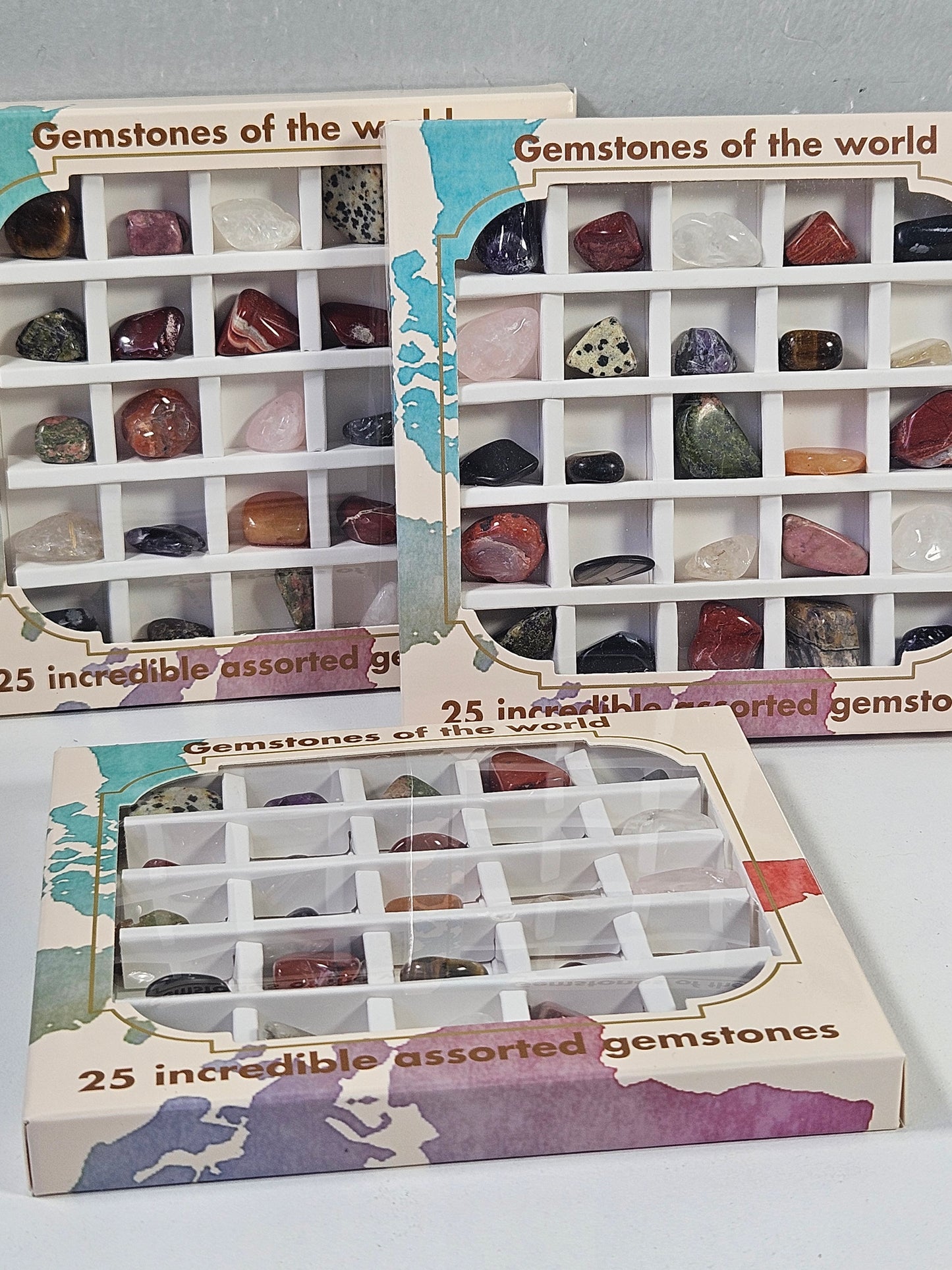 Verzamelbox met 25 trommelsteentjes