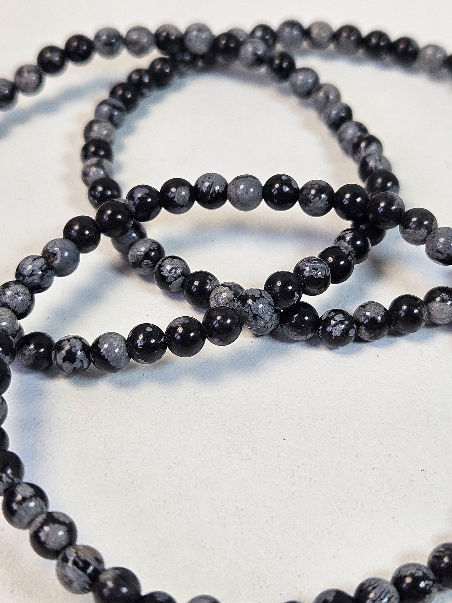 Sneeuwvlok obsidiaan armband 4mm