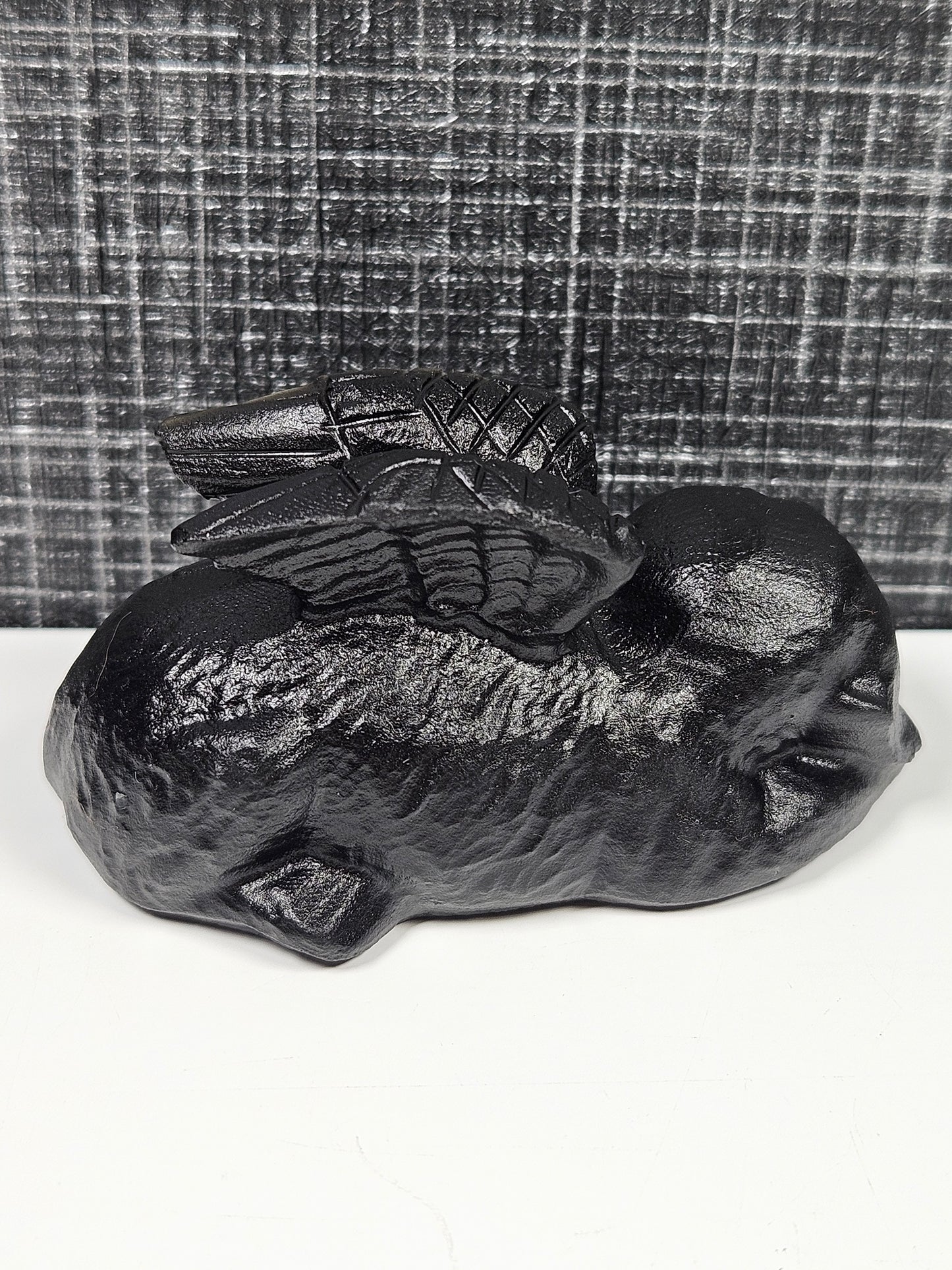 Zwarte obsidiaan gedenkhondje