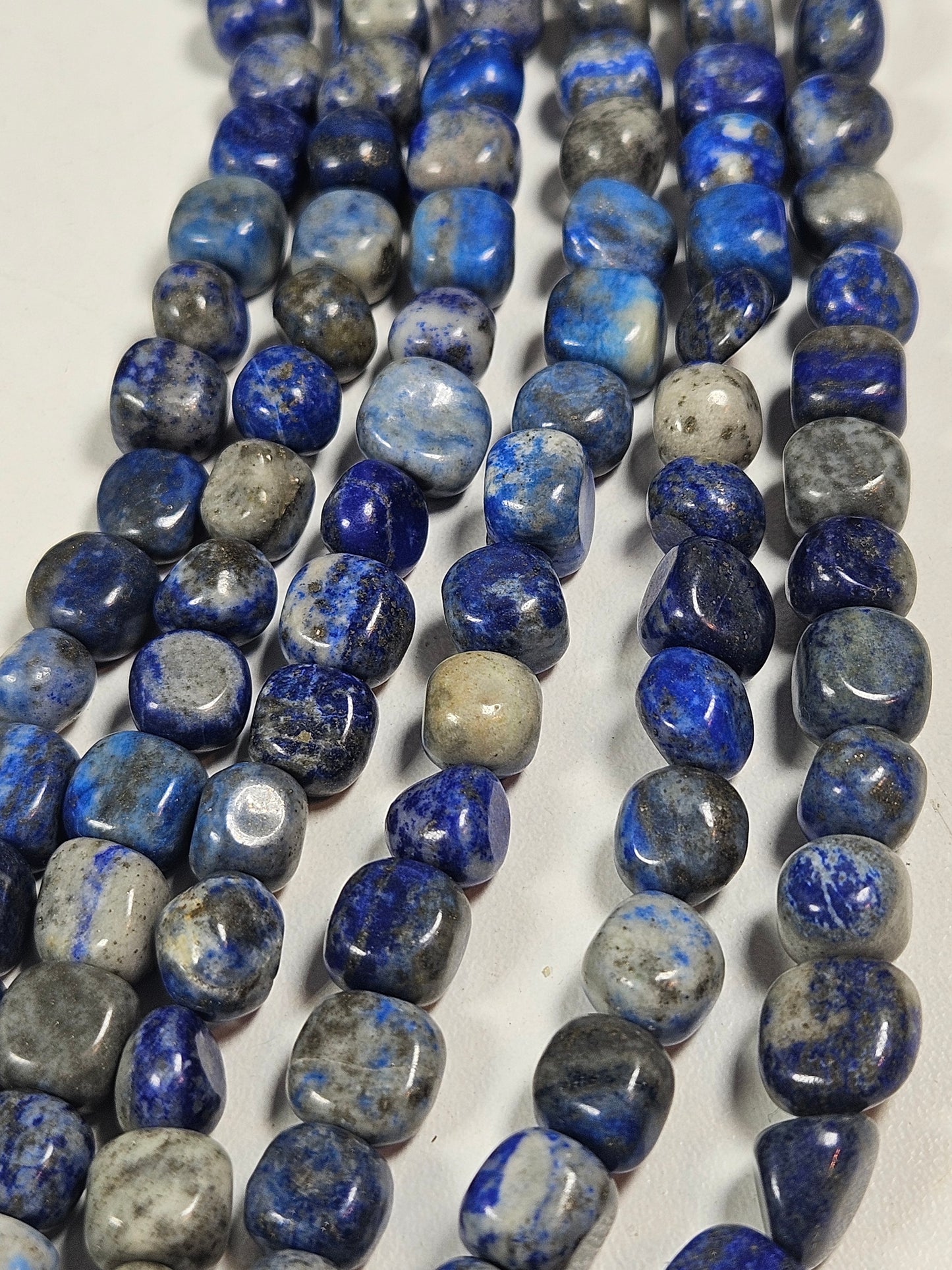 Lapis lazuli kralenstreng trommel 8mm