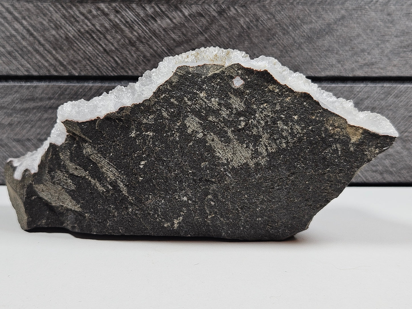 Roze chalcedoon op standvlak 428 gram