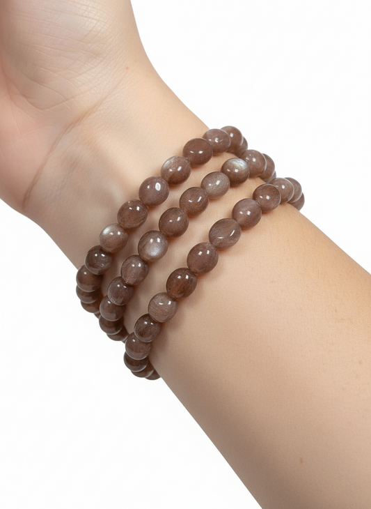 Roze Maansteen/Zonnesteen trommelsteenarmband 9mm