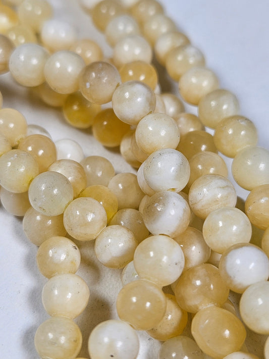 Honingcalciet kralenstreng 6mm