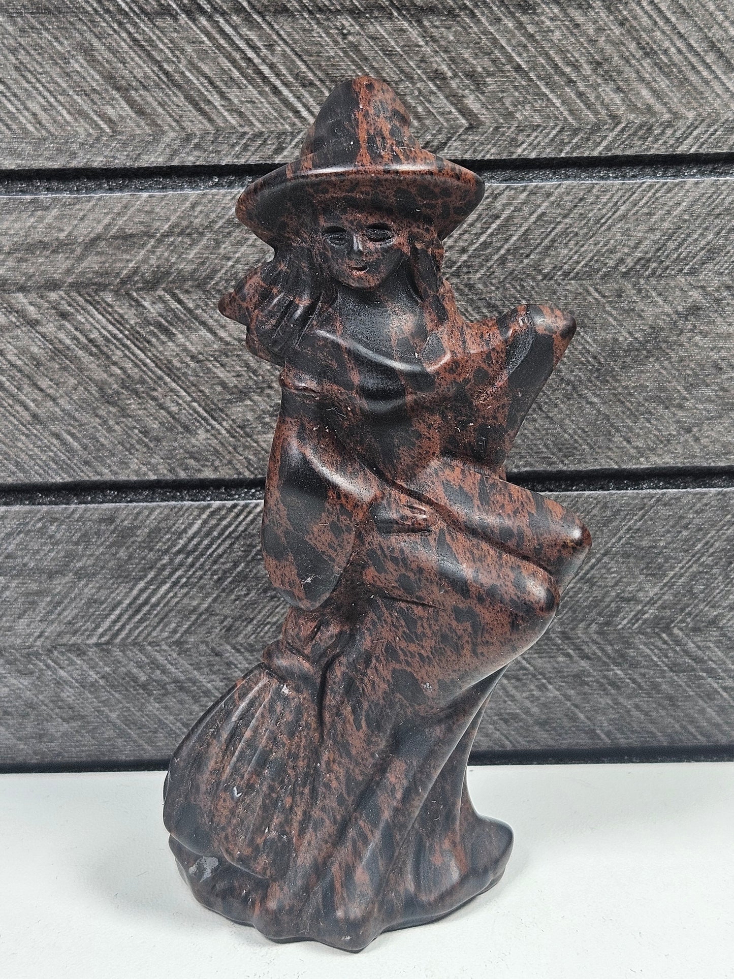 Mahonie Obsidiaan heks op bezem