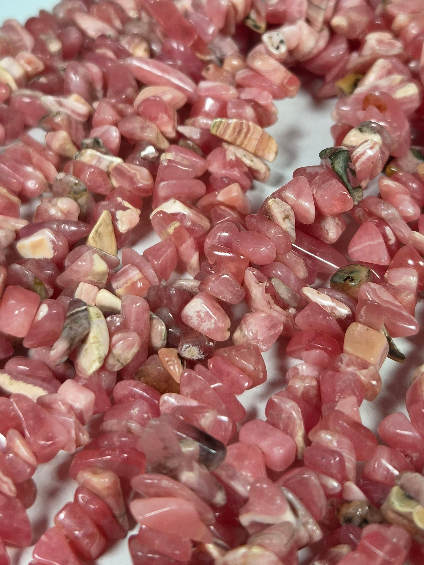 Rhodochrosiet kralenstreng Split (extra lang) 8mm