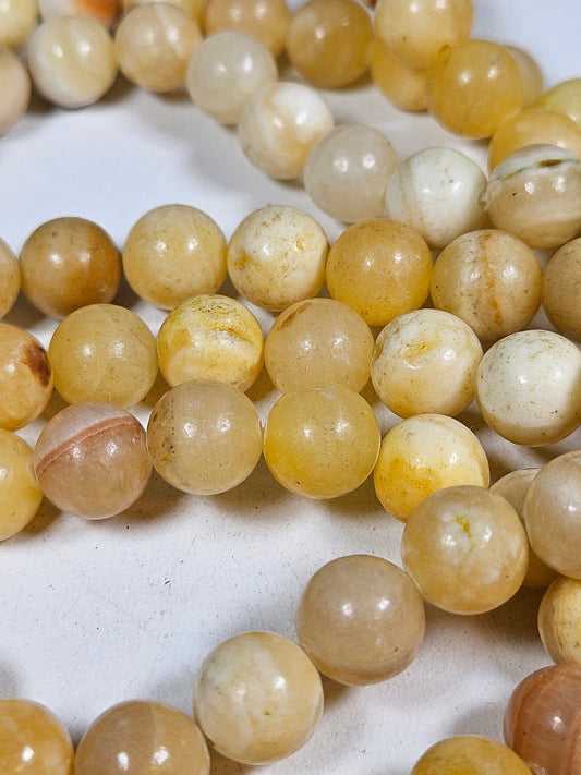 Honingcalciet kralenstreng 10mm