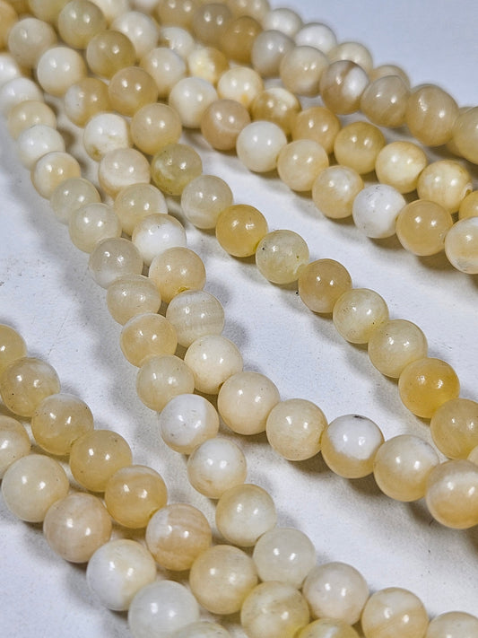 Honingcalciet kralenstreng 6mm